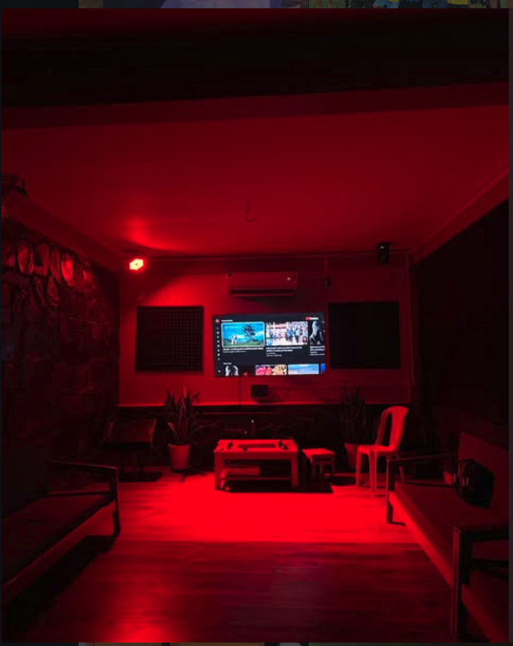 Red-lit karaoke lounge